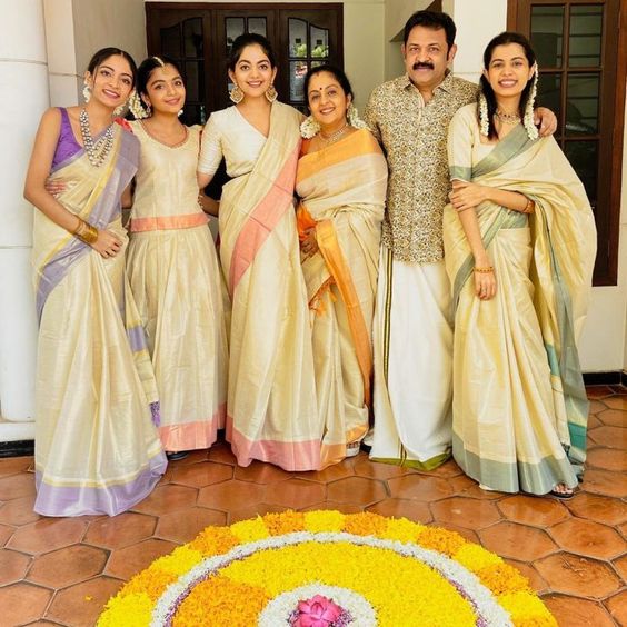 most women extravagant temples sandal paste upper clothing short blouse pattola silk cloth wrapped different colours half sari rich heritage cultural essence