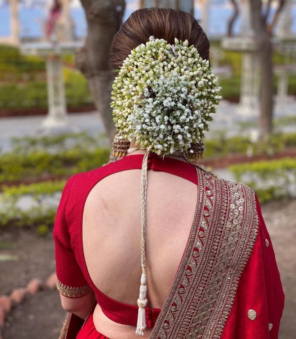 traditional look sleek low ponytail messy style hairstyles for saree