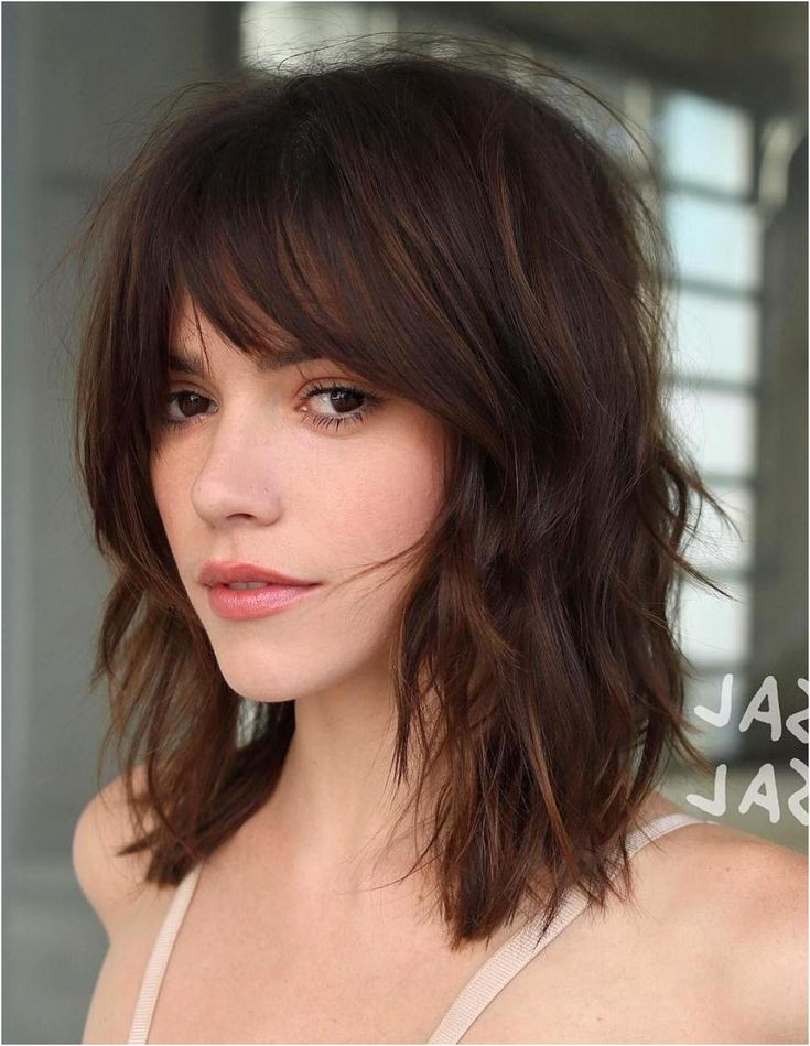 Tousled Layered Haircut With Bangs