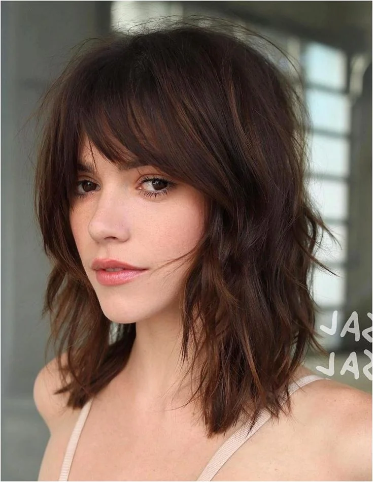 Tousled Layered Haircut With Bangs